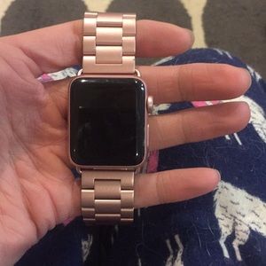 Rose gold series 2 Apple Watch with metal band